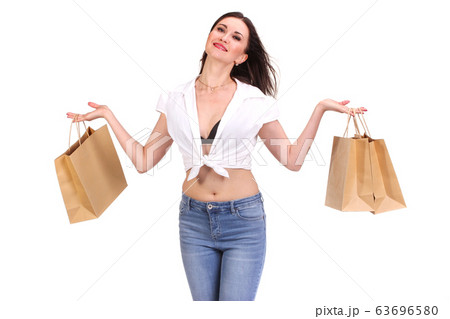 Brunette woman with shopping bags 63696580