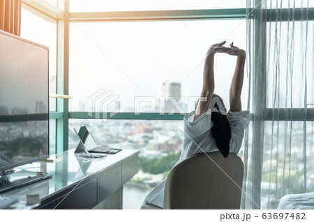 Work-life quality balance concept with happy city lifestyle Asian girl having a good day waking up  63697482