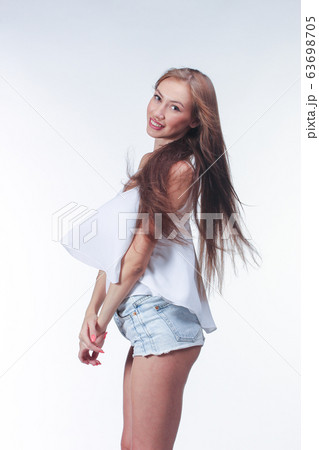 young woman in blue short 63698705