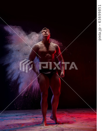 Shritless man in white dust cloud view Shritless man in white dust cloud view 63699851