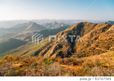 Mountains landscape from Monsoon Palace in Udaipur, India Mountains landscape from Monsoon Palace in Udaipur, India 63707569