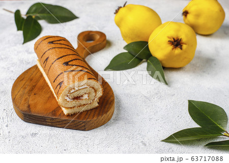 Quince jam cake roll with fresh organic quinces Quince jam cake roll with fresh organic quinces 63717088