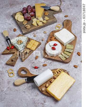 Various types of cheese on light brown background,top view Various types of cheese on light brown background,top view 63718047