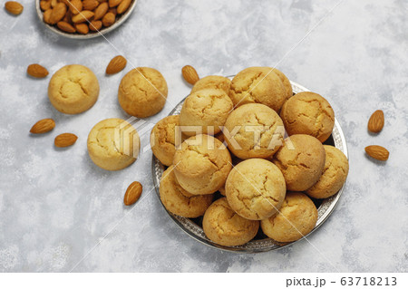 Healthy homemade almond cookies on concrete background,top view Healthy homemade almond cookies on concrete background,top view 63718213