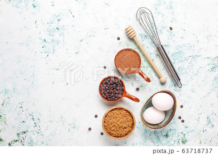 Cupcake baking background with kitchen utensils. Cupcake baking background with kitchen utensils. 63718737