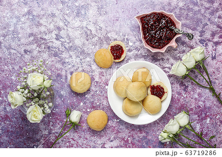 Homemade delicious cookies serving with raspberry jam,top view 63719286