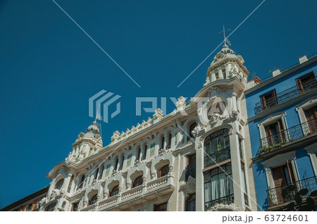 Colorful buildings full of windows and balconies in Madrid 63724601