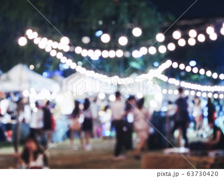 Festival Event Party outdoor Blur crowd people holiday background Festival Event Party outdoor Blur crowd people holiday background 63730420
