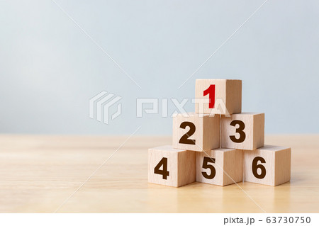 Wood block stacking as step stair with number 63730750