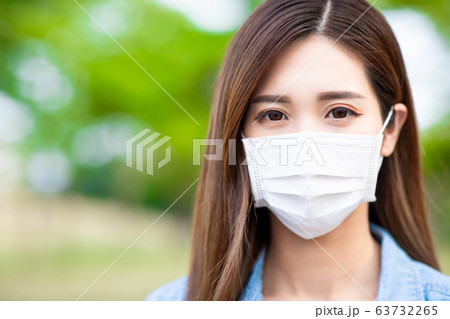 Asian woman with facial mask Asian woman with facial mask 63732265