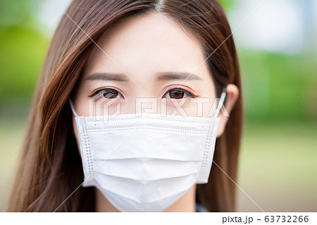 Asian woman with facial mask Asian woman with facial mask 63732266