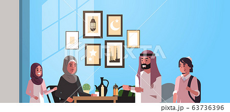 muslim family celebrating ramadan kareem holy month living room interior arabic parents and children in traditional clothes spending time together flat horizontal portrait muslim family celebrating ramadan kareem holy month living room interior arabic parents and children in traditional clothes spending time together flat horizontal portrait 63736396