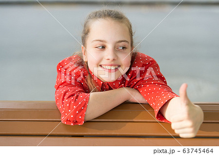 Kid long hair happy smile face. Summer holidays. Kid long hair happy smile face. Summer holidays. 63745464