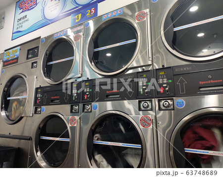 Laundry machines. This outlet provides self-service laundry and drying machines. Open 24 hours. 63748689