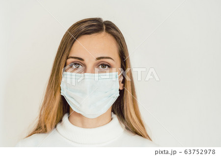 Worried woman during Covid-19 crisis in quarantine 63752978