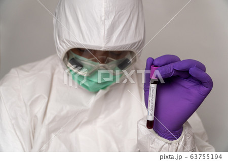 Doctors in the protective suits and masks are Doctors in the protective suits and masks are 63755194