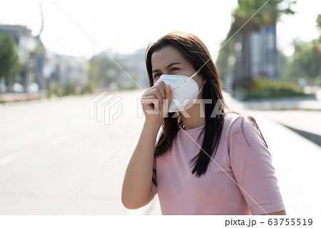 Close up of a woman in a suit wearing Protective Close up of a woman in a suit wearing Protective 63755519