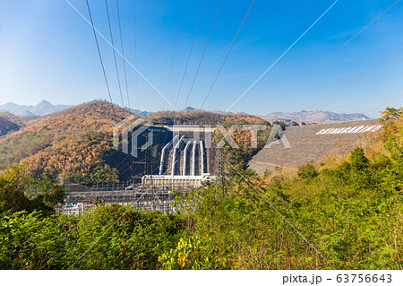 Landscape view around of Srinakarin Dam the power station with large mountains and many trees at Kanchanaburi, Thailand. To generate electricity in the western region of the country 63756643