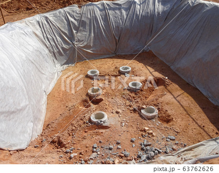 Bore pile cut to level by the construction workers. Next stage is fabricating the pile cap's reinforcement bar and formworks. Bore pile cut to level by the construction workers. Next stage is fabricating the pile cap's reinforcement bar and formworks. 63762626