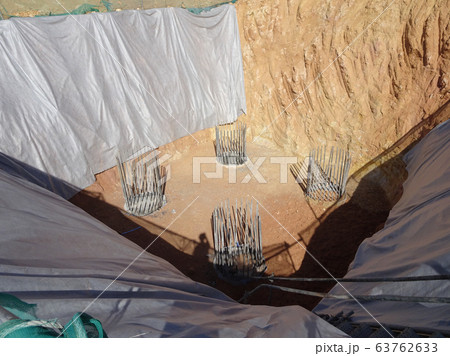 Bore pile cut to level by the construction workers. Next stage is fabricating the pile cap's reinforcement bar and formworks. Bore pile cut to level by the construction workers. Next stage is fabricating the pile cap's reinforcement bar and formworks. 63762633