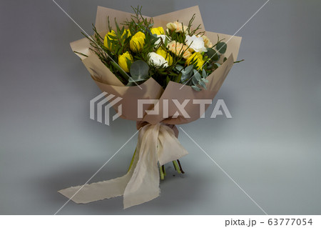 Beautiful bouquet in vintage style, light gray Beautiful bouquet in vintage style, light gray 63777054