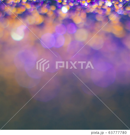 Abstraction colorful bokeh on a dark background. 63777780