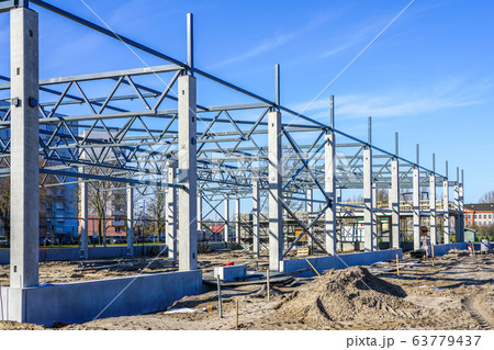 The steel frame of a building under construction The steel frame of a building under construction 63779437