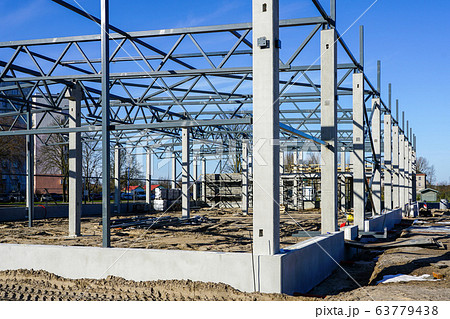 The steel frame of a building under construction The steel frame of a building under construction 63779438