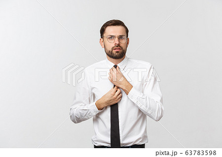 Close up portrait of serious handsome attractive smart intelligent with beard man dressed in formal outwear 63783598