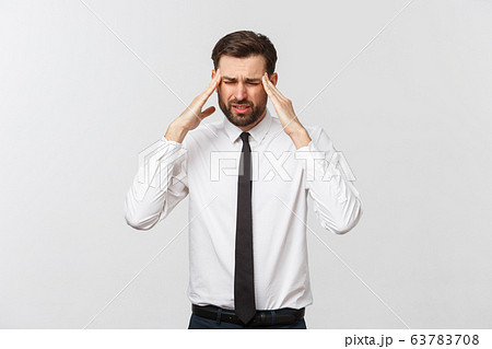 Young caucasian businessman feeling headache ,isolated on white 63783708