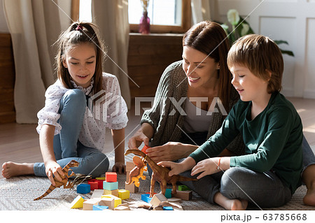 Mom enjoying spending free leisure weekend time with two kids. Mom enjoying spending free leisure weekend time with two kids. 63785668