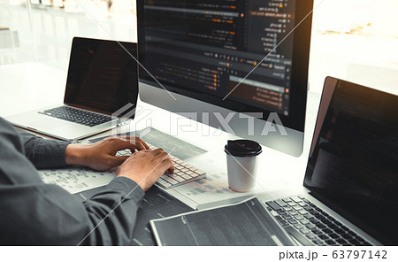 Asian man working code program developer computer Asian man working code program developer computer 63797142
