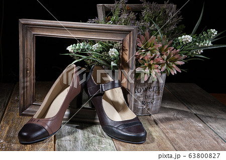 Different Shoes On Wooden Table Different Shoes On Wooden Table 63800827