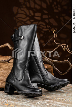 Different Shoes On Wooden Table 63800906