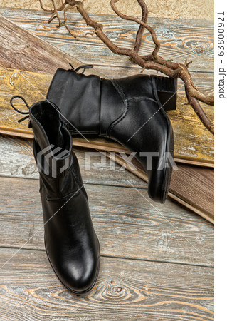 Different Shoes On Wooden Table Different Shoes On Wooden Table 63800921