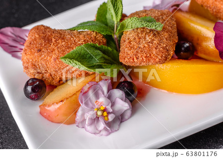 Fresh scented cheese sticks with baked apple Fresh scented cheese sticks with baked apple 63801176