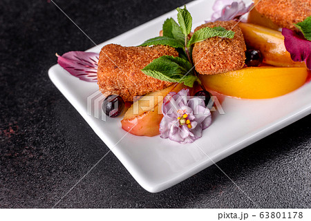 Fresh scented cheese sticks with baked apple Fresh scented cheese sticks with baked apple 63801178
