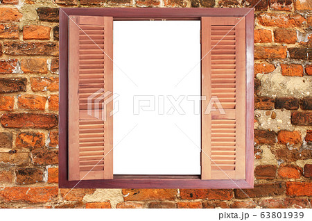 Retro window frame with wooden shutters on old 63801939