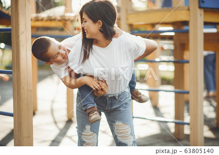 Mother with little child on a playground 63805140