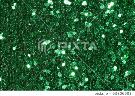 Green background with contrast and glitter. 63806603