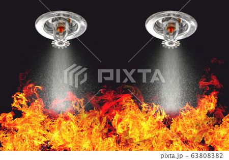 Image of Fire Sprinklers Spraying with fire background. Fire sprinklers are part of an overall safety protocol for fire and life safety. Image of Fire Sprinklers Spraying with fire background. Fire sprinklers are part of an overall safety protocol for fire and life safety. 63808382