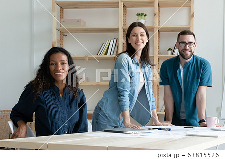 Portrait of diverse colleagues posing together in office 63815526