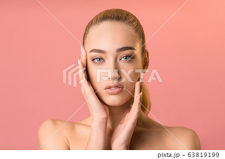 Sensual Blonde Girl Touching Perfect Face Posing In Studio Sensual Blonde Girl Touching Perfect Face Posing In Studio 63819199