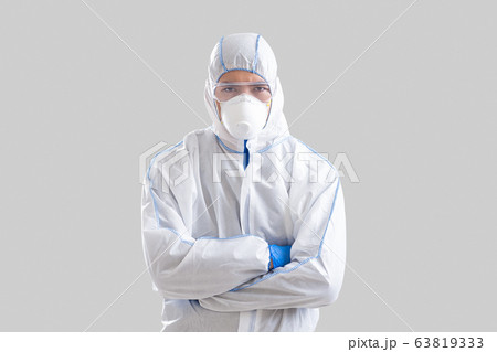 Coronavirus epidemic control concept. Asian man with crossed arms 63819333