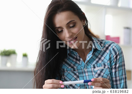 Girl has feeling surprise looking pregnancy test Girl has feeling surprise looking pregnancy test 63819682
