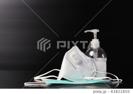 Sanitizer gel or antibacterial soap and face mask for Covid-19 coronavirus preventive 63822850