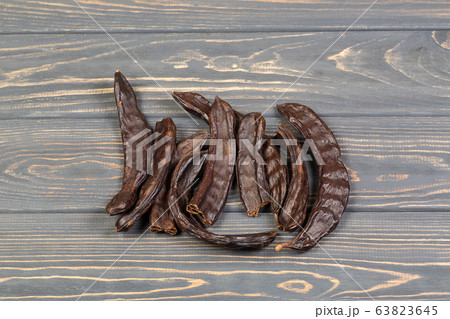 Carob healthy organic sweet carob pods on wooden 63823645