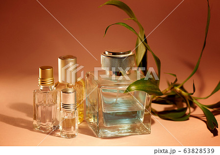 A large bottle of men's perfume and oil for the fragrance. Tropical smell.Aromatherapy, perfumes. 63828539