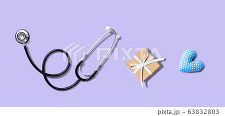 Stethoscope with a gift and a heart cushion 63832803