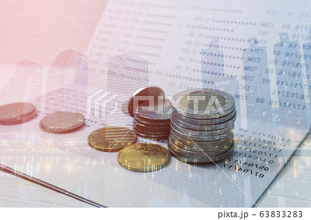 Double exposure cityscape background of coins on statement book bank of accounting for finance banking concept Double exposure cityscape background of coins on statement book bank of accounting for finance banking concept 63833283
